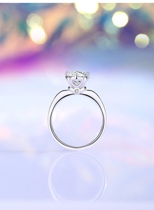Macro side view of 1ct moissanite ring with heart-shaped setting on S925 silver band