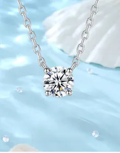 Macro view of S925 silver necklace featuring a classic four-prong moissanite pendant