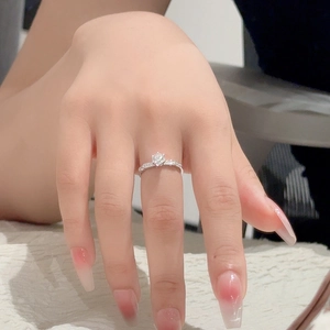 Elegant S925 silver 0.5ct Moissanite ring with classic six-prong setting on female hand