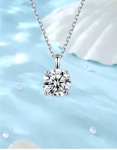Macro view of 1-carat round cut moissanite pendant with four-prong setting on S925 silver
