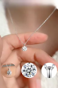 Detail of 5mm cubic zirconia pendant with 925 silver chain and mirror polish finish