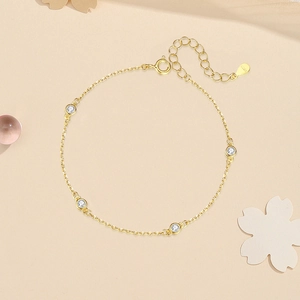 Minimalist S925 sterling silver gold bracelet featuring four round clear zircon stones