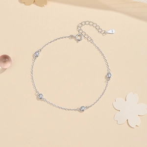 Minimalist S925 sterling silver chain bracelet with four sparkling round cubic zirconia stones