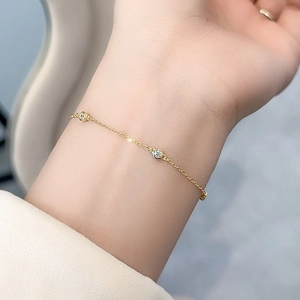 Minimalist S925 silver gold bracelet featuring bezel-set round sparkling gemstones