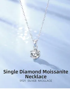 Detailed view of 5mm round moissanite pendant with classic six-prong setting in S925 silver