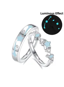 Detail of S925 sterling silver couple rings showing the luminous star and S925 stamp