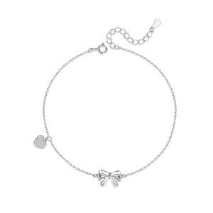 Minimalist S925 sterling silver anklet featuring a polished bow and pavé heart charm