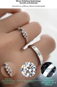 Detail of S925 silver couple rings with cubic zirconia stars and polished finish