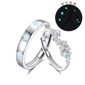Luminous S925 silver couple rings with star patterns and night glow effect feature