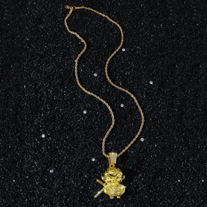 Hip hop cartoon Sun Wukong pendant necklace with sparkling diamonds on a gold rope chain