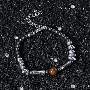 Tiger eye stone bead bracelet with silver irregular metal pieces and bamboo tube accents