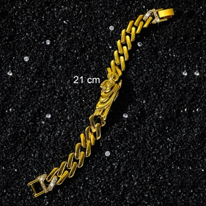 Detail of 21cm gold-plated St. Jude hip hop bracelet with iced-out rhinestone buckle