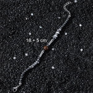Tiger eye and hematite beaded bracelet with 18+5cm adjustable chain on black stones