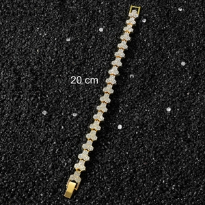 Detail view of 20cm gold plated hip hop bracelet with iced out crystals and hexagonal links