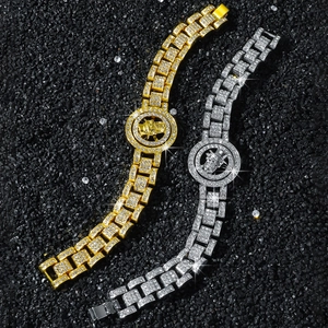 Bracelet hip hop pour hommes avec crâne rotatif et strass brillants en or et argent