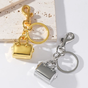 Polished zinc alloy handbag keychains in gold and silver finishes with lobster clasps