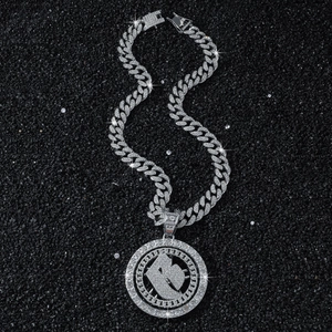 Iced out hip hop Cuban chain necklace with a rotating letter R pendant and silver stones