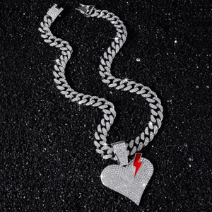 Men's hip-hop iced out Cuban chain with a red lightning broken heart pendant on dark stones
