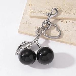 Fashionable black resin cherry keychain with silver heart ring and lobster clasp