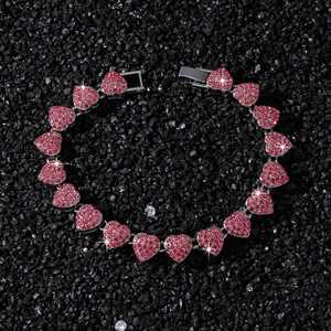 Sparkling silver chain bracelet with interconnected red rhinestone heart links and fold-over clasp