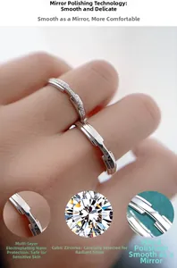 Macro view of couple rings showing polished finish and cubic zirconia settings