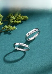 Detail of S925 sterling silver adjustable rings with Forever Love engraving
