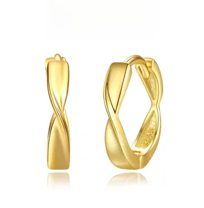 Macro shot of S925 sterling silver Mobius hoop earrings with detailed hallmark engraving