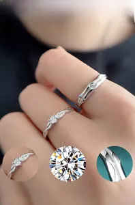 Detail of twisted silver band and bamboo texture rings set with cubic zirconia stones
