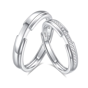 Polished S925 sterling silver couple rings set with row of sparkling white diamonds