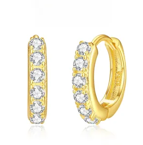 Close-up of S925 sterling silver gold hoop earrings with sparkling pavé cubic zirconia