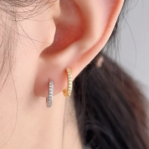 Sparkling S925 sterling silver huggie earrings with pavé crystals in gold and silver
