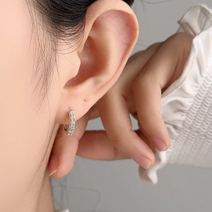Minimalist S925 sterling silver huggie earrings with a row of sparkling round zircons