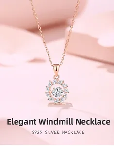 Close-up of S925 sterling silver windmill necklace with sparkling moissanite stones