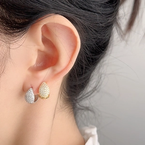 Elegant S925 silver teardrop hoop earrings with micro-pave crystals on model