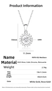 Macro shot of S925 silver windmill pendant with moissanite starburst detailing