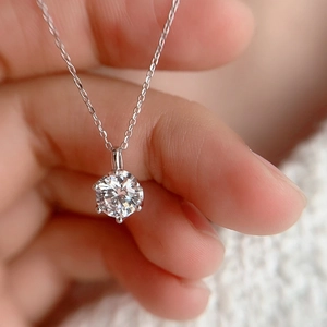 Classic 925 sterling silver necklace featuring a 1 carat round moissanite solitaire pendant