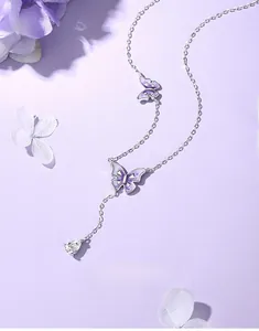 Detail of 925 silver Y-shaped necklace with purple gradient butterflies and pear-cut zircon