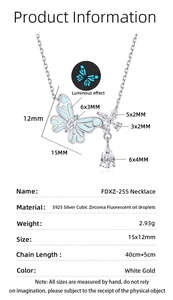 Detailed view of luminous blue butterfly pendant with S925 silver chain and dimensions