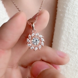 Rose gold s925 silver necklace with dancing diamond pendant and petal-shaped zirconia