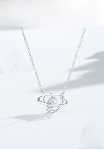 Close-up of S925 silver heart necklace with blue moonstone and delicate micro-pave diamonds