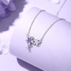 Silver flower necklace with purple gradient enamel and sparkling zirconia pendant