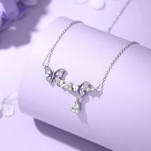 925 silver necklace with purple enamel butterfly and drop zircon pendant on stand