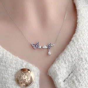 925 silver necklace with purple enamel butterflies and a drop-shaped cubic zirconia