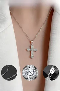 Macro detail of S925 silver cross pendant with sparkling cubic zirconia inlay and O-chain