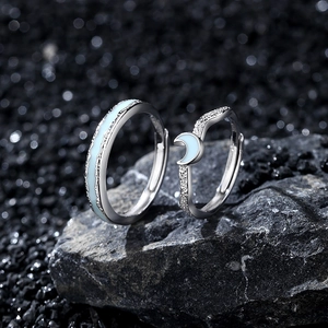 Star and moon themed 925 sterling silver couple rings set with blue enamel accents