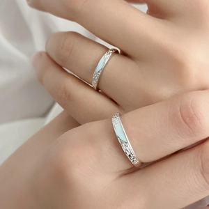 Minimalist 925 sterling silver couple rings with mint green enamel and hammer texture