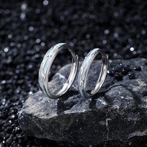 Luminous S925 sterling silver couple rings with blue enamel and wave patterns