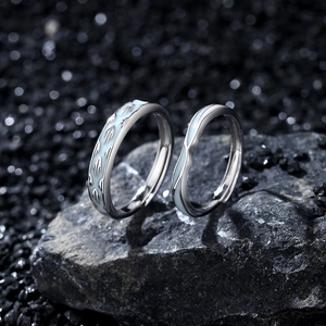 S925 sterling silver couple rings with blue bird engraving on dark volcanic stone