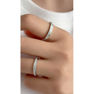 Luminous S925 sterling silver couple rings with light blue enamel on model hands