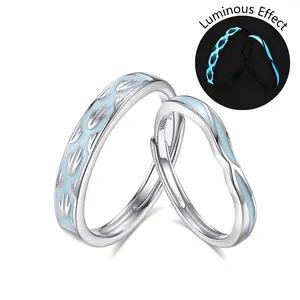 Luminous S925 sterling silver couple rings with blue feather pattern and glowing effect